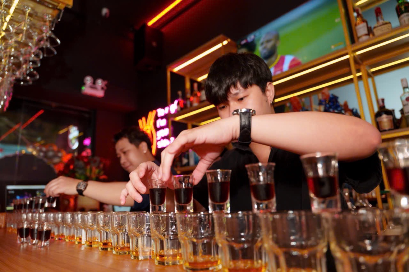 Drinks being poured at The Huddle Sports Bar